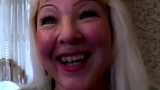 Smiling granny eagerly gives a passionate blowjob before going to bed.